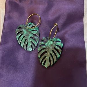Anthropologie Large acrylic banana leaf earrings